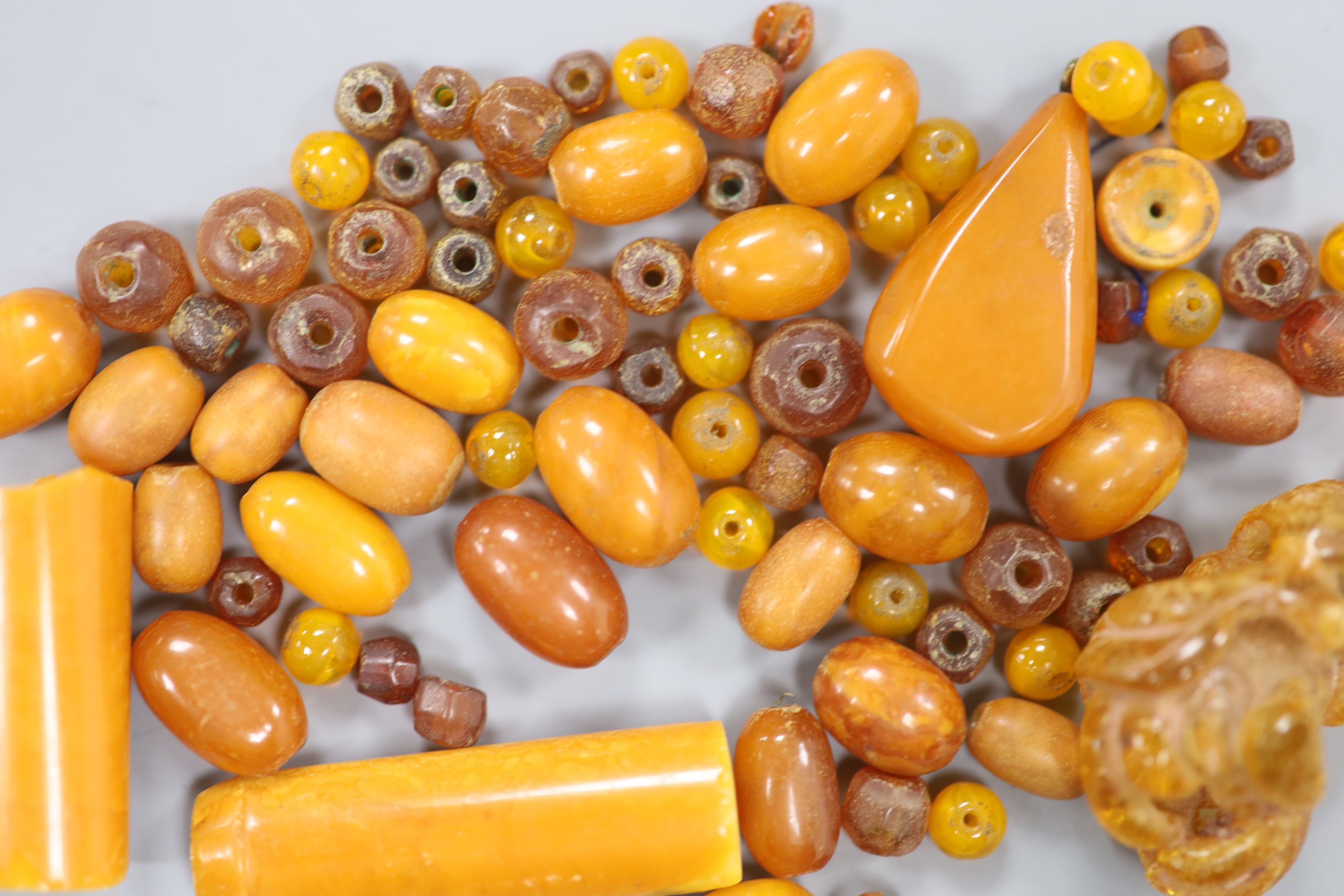 A collection of amber, a Chinese buddha hand amber